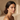 Woman wearing a brown ZILK silk night scrunchie