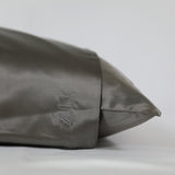 ZILK logo embroidered on dark gray silk pillowcase