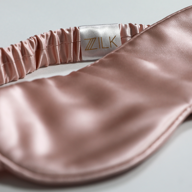 ZILK Lightpink silk sleep mask with light-blocking design