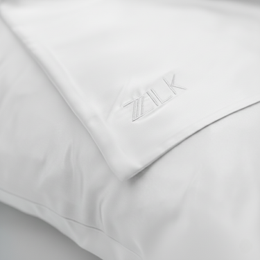 ZILK logo embroidered on white silk pillowcase