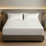 ZILK silk fitted sheet styled on bed - side view